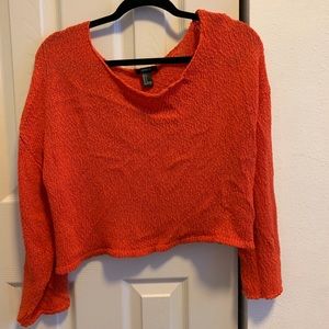 Large red/orange cropped sweater